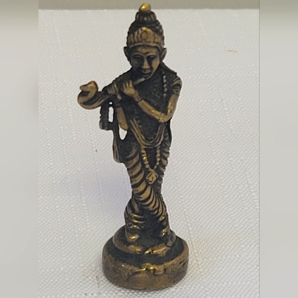 Classic pocket-sized brass statue from Nepal of Shri Krishna playing his flute